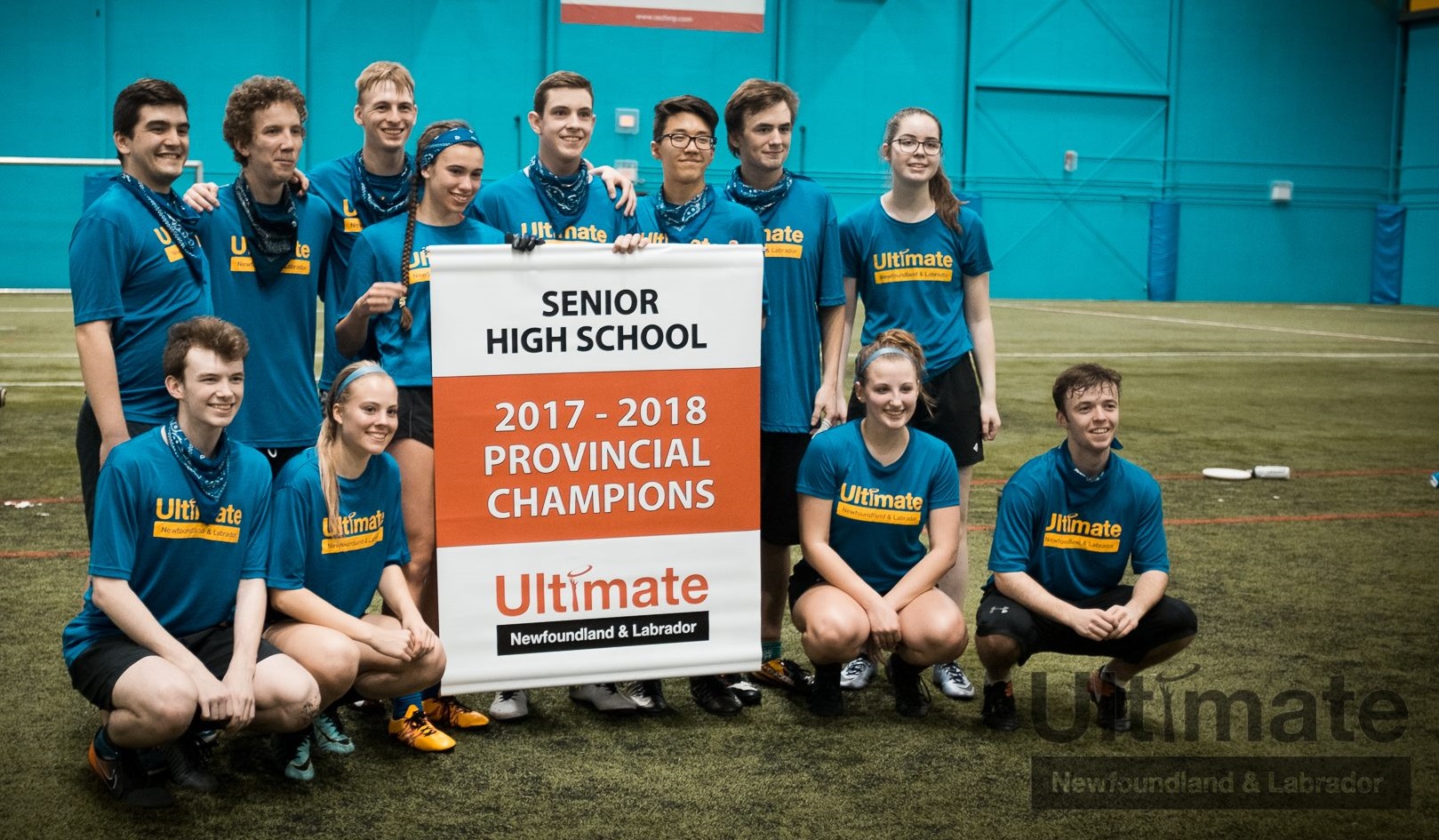 The team from Mount Pearl Senior High poses with the banner for the 2018 Senior High Provincial Tournament.