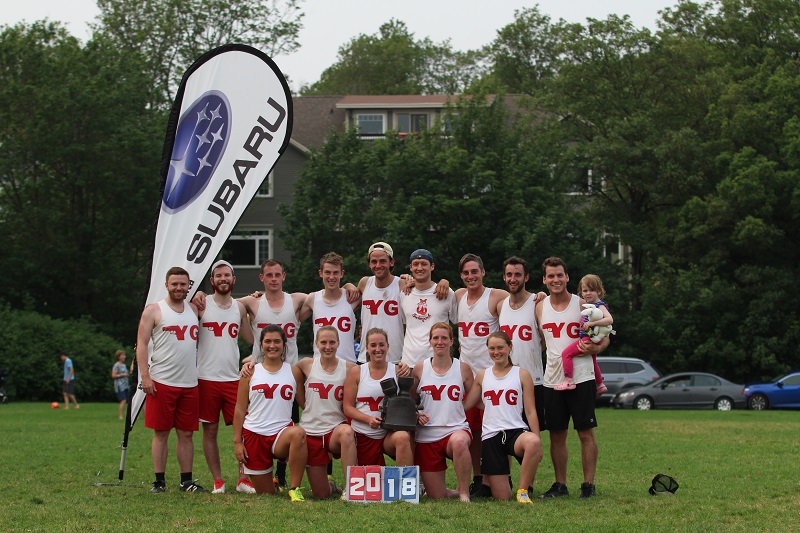 Young Guns poses with the Flaherty Cup after winning the 2018 summer league title from Mile Zero Ultimate.