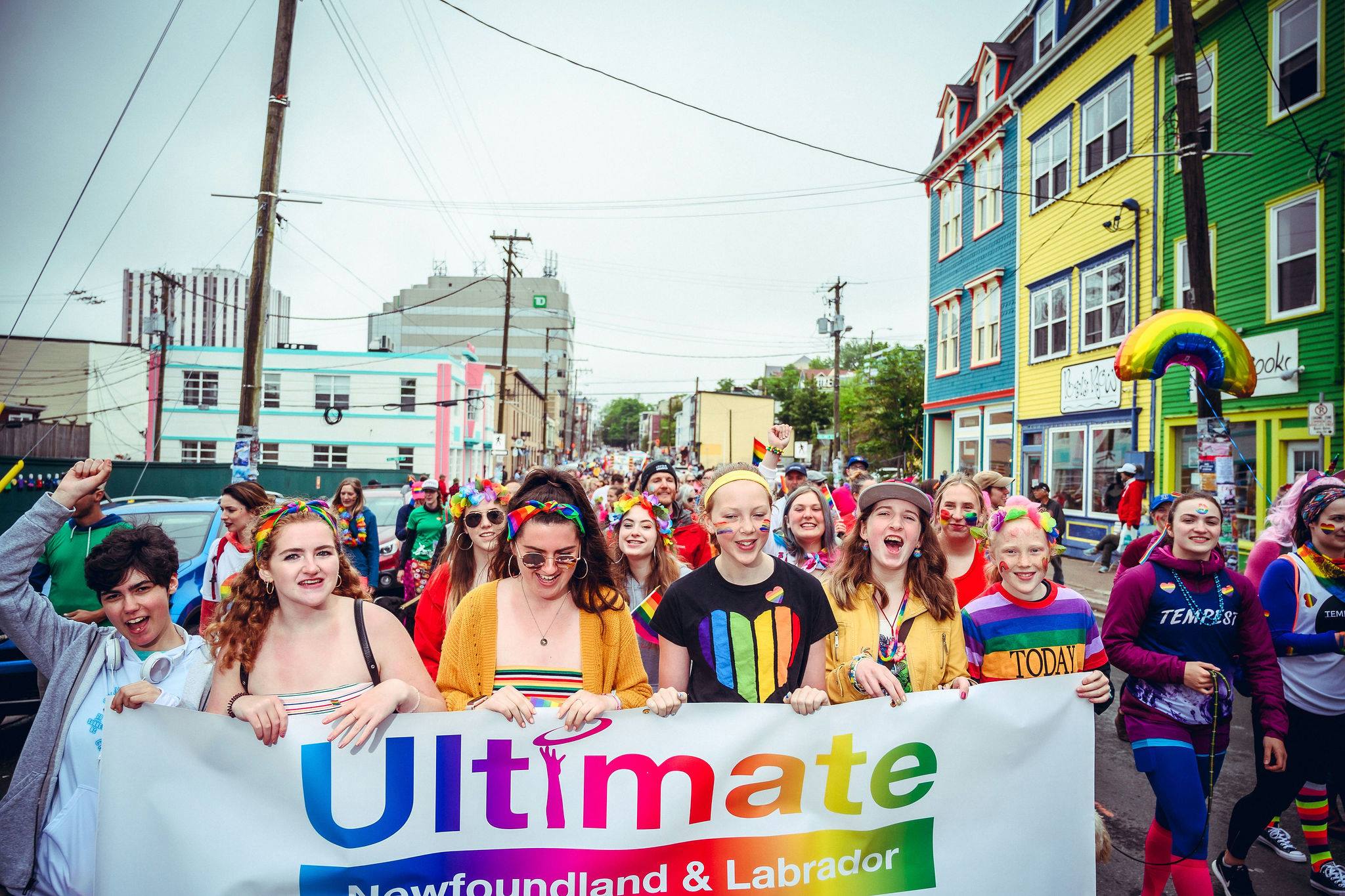 Members of the ultimate delegation carrying a colourful banner in the 2019 St. John's Pride Parade.