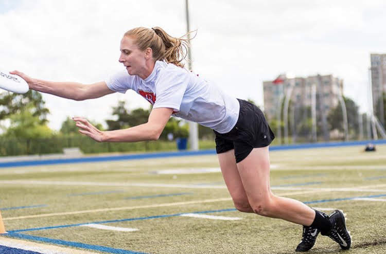Erin Daly drags her toe to catch the disc in bounds in the Canadian Ultimate Championships' mixed division play. Photo courtesy of Ultimate Canada.
